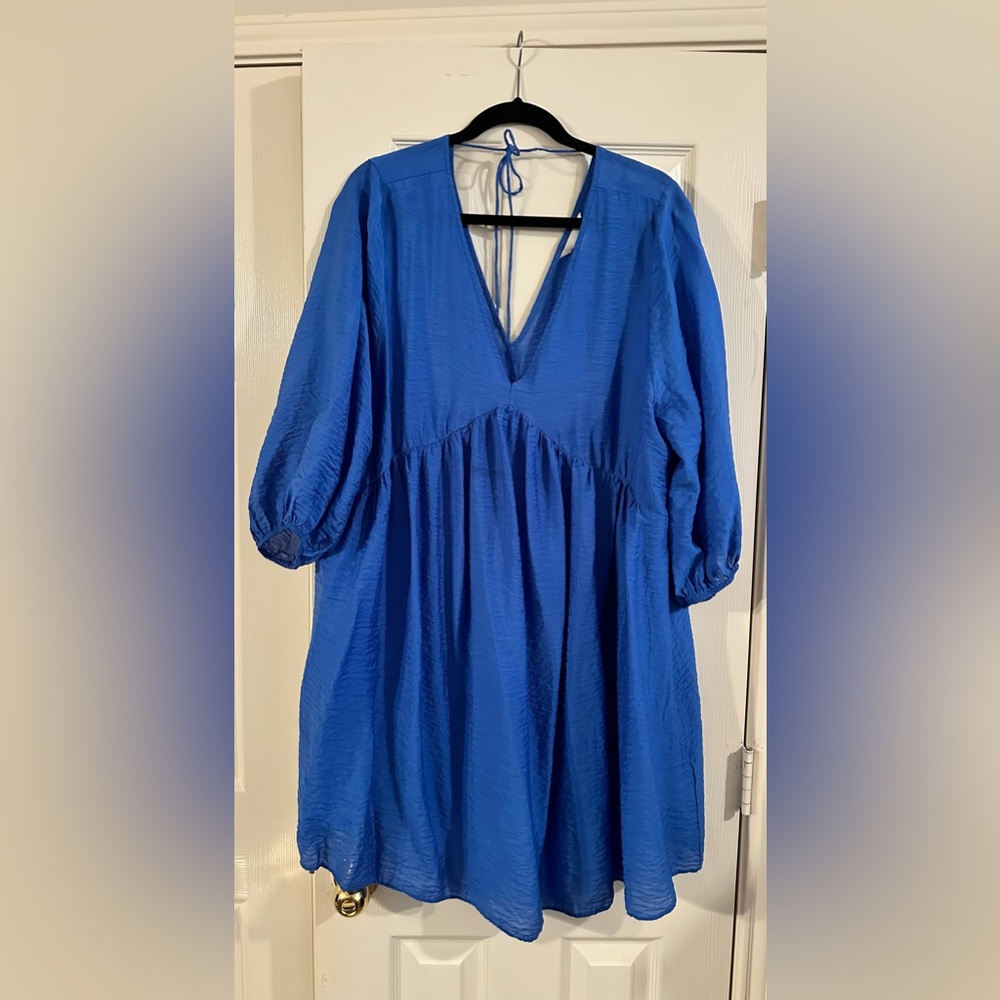 H&M silky blue flowy dress, ties behind the neck.